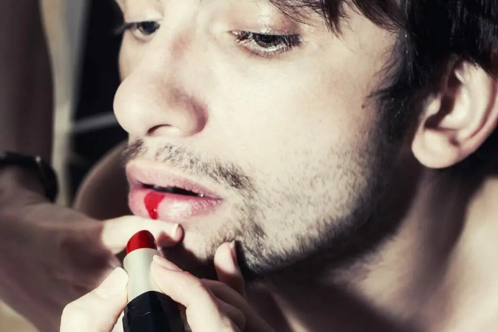 man with red lipstick